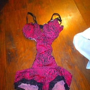 Pink cheetah print body suit